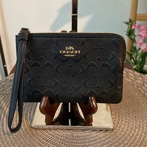 COACH Corner Zip Wristlet in SIGNATURE Leather